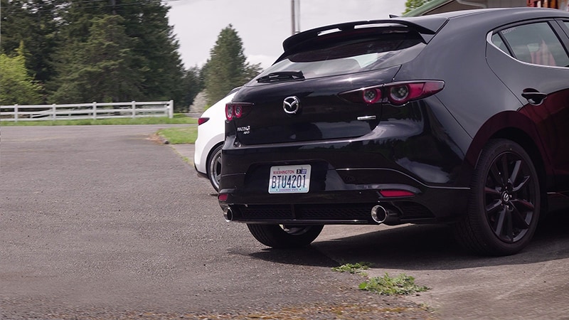 Axle Back Exhaust for 2019+ Mazda 3 installed on black hatchback